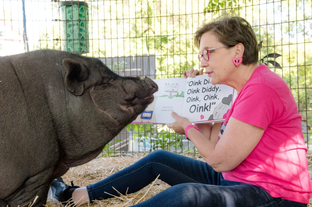 Tina reading to Bacon